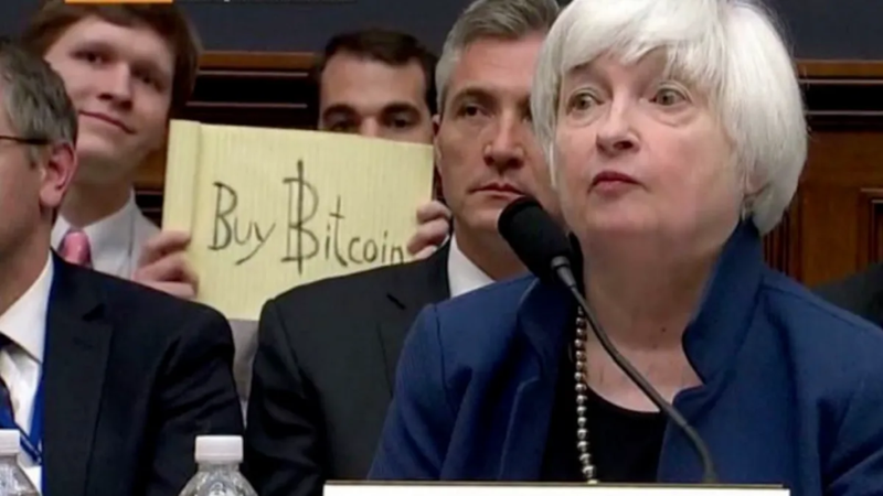 janet yellen buy bitcoin photobomb